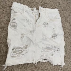 White ripped denim skirt